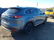 ✅ 2022 Mazda CX-9 Carbon Edition • VIN: JM3TCBDY1N0617356 • Lot: 43690029. Wystawiony na IAAI z przebiegiem 49 351 mil. Bezpłatny archiwum sprzedaży aukcyjnych z USA i szczegółowy raport historii pojazdu na DreamBid. Zdjęcie 4.