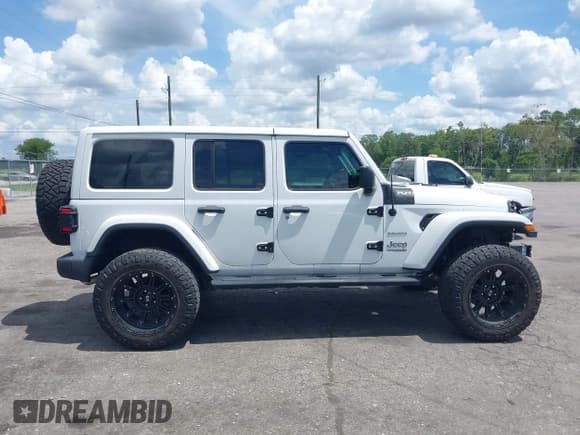 ✅ 2021 Jeep Wrangler Unlimited Sahara Altitude • VIN: 1C4HJXEN7MW518395 • Lot: 42484314. Listed on IAAI with 55,000 mi. Free auction sales archive from the USA and detailed vehicle history report at DreamBid. Image 13.