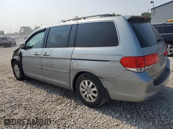 ✅ 2010 Honda Odyssey EX-L • VIN: 5FNRL3H74AB034608 • Lot: 59262505. Listed on Copart with 243,186 mi. Free auction sales archive from the USA and detailed vehicle history report at DreamBid. Image 2.