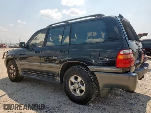 ✅ 2001 Toyota Land Cruiser • VIN: JTEHT05J812013608 • Lot: 81148325. Listed on Copart with 162,133 mi. Free auction sales archive from the USA and detailed vehicle history report at DreamBid. Image 2.