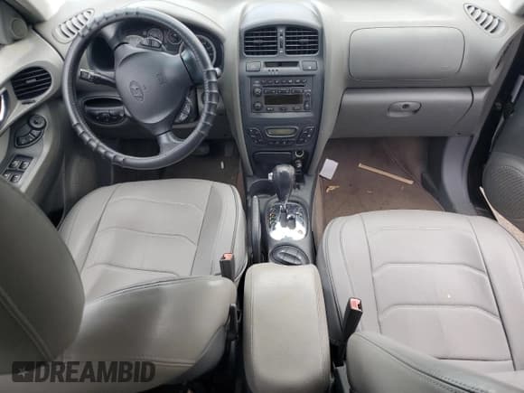 ✅ 2006 Hyundai Santa Fe GLS • VIN: KM8SC73E36U077765 • Лот: 69036785. Опубликован ранее на Copart с пробегом 80 120 миль. Бесплатный доступ к архиву аукционных продаж из США и подробный отчёт об истории автомобиля на DreamBid. Изображение 8.