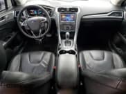 ✅ 2015 Ford Fusion Titanium • VIN: 3FA6P0K91FR279510 • Лот: 52875435. Опубликован ранее на Copart с пробегом 93 519 миль. Бесплатный доступ к архиву аукционных продаж из США и подробный отчёт об истории автомобиля на DreamBid. Изображение 8.