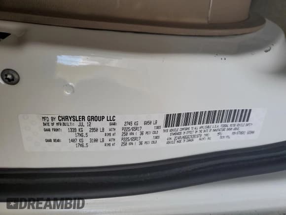 ✅ 2012 Volkswagen Routan SE • VIN: 2C4RVABG6CR391870 • Lot: 90501035. Listed on Copart with 96,603 mi. Free auction sales archive from the USA and detailed vehicle history report at DreamBid. Image 13.