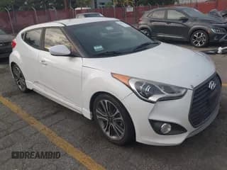 ✅ 2016 Hyundai Veloster Turbo • VIN: KMHTC6AE5GU289375 • Lot: 43699411. Wystawiony na IAAI z przebiegiem 114 395 mil. Bezpłatny archiwum sprzedaży aukcyjnych z USA i szczegółowy raport historii pojazdu na DreamBid. Zdjęcie 1.