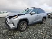 ✅ 2022 Toyota RAV4 Hybrid XLE Premium • VIN: JTMB6RFV4ND056070 • Лот: 93304705. Опубликован ранее на Copart с пробегом 37 226 миль. Бесплатный доступ к архиву аукционных продаж из США и подробный отчёт об истории автомобиля на DreamBid. Изображение 1.