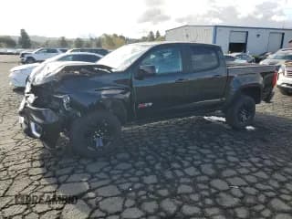 ✅ 2018 Chevrolet Colorado 4WD Z71 • VIN: 1GCGTDEN8J1323662 • Лот: 84644425. Опубликован ранее на Copart с пробегом 84 990 миль. Бесплатный доступ к архиву аукционных продаж из США и подробный отчёт об истории автомобиля на DreamBid. Изображение 1.