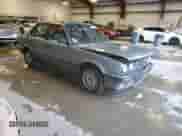 1989 BMW 3 Series 325i with VIN WBAAD2305KED23370, listed as a Copart auction lot 43777225 with 194,949 mi miles and Salvage title. Bid and sale history available at DreamBid. Image 4.