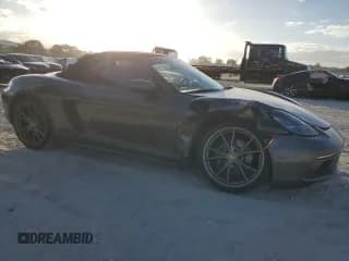 ✅ 2022 Porsche Boxster • VIN: WP0CA2A88NS205166 • Лот: 85168144. Опубликован ранее на Copart с пробегом 5 049 миль. Бесплатный доступ к архиву аукционных продаж из США и подробный отчёт об истории автомобиля на DreamBid. Изображение 4.