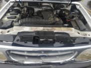 ✅ 1998 Ford Explorer XL • VIN: 1FMZU34X5WZB88907 • Лот: 60111215. Опубликован ранее на Copart с пробегом 128 492 миль. Бесплатный доступ к архиву аукционных продаж из США и подробный отчёт об истории автомобиля на DreamBid. Изображение 12.