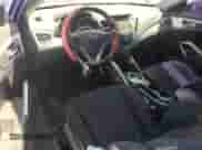 2013 Hyundai Veloster RE:MIX z VIN KMHTC6AD1DU139704, wystawiony jako Copart lot #67167074 z przebiegiem 155 099 mil mil oraz Szkoda całkowita • Salvage title. Historia ofert i sprzedaży dostępna na DreamBid. Obrazek 8.