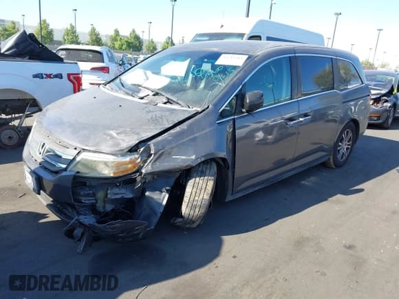 ✅ 2012 Honda Odyssey EX-L • VIN: 5FNRL5H6XCB139546 • Lot: 43215411. Listed on IAAI with 93,343 mi. Free auction sales archive from the USA and detailed vehicle history report at DreamBid. Image 2.