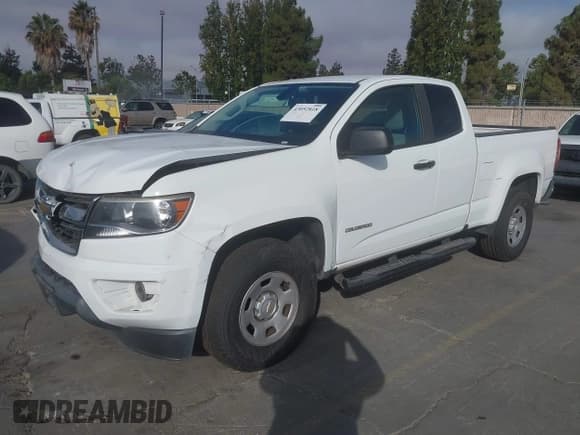✅ 2018 Chevrolet Colorado 2WD Work Truck • VIN: 1GCHSBEA4J1118431 • Lot: 43052818. Listed on IAAI with 135,573 mi. Free auction sales archive from the USA and detailed vehicle history report at DreamBid. Image 2.