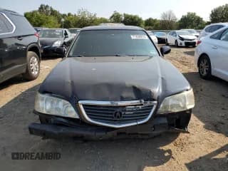 ✅ 2002 Acura RL • VIN: JH4KA96512C013028 • Лот: 71436914. Опубликован ранее на Copart с пробегом 142 527 миль. Бесплатный доступ к архиву аукционных продаж из США и подробный отчёт об истории автомобиля на DreamBid. Изображение 5.
