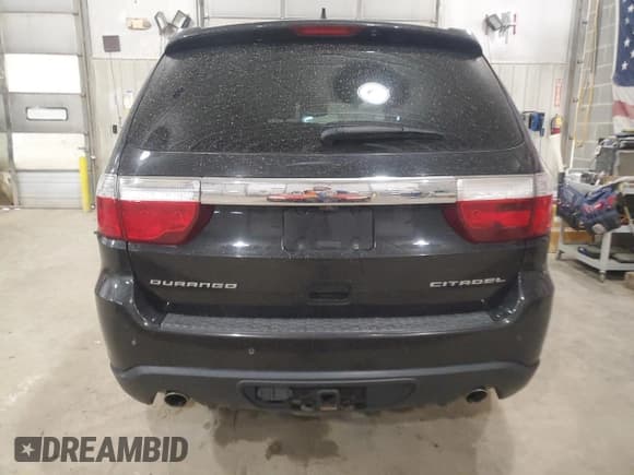 ✅ 2013 Dodge Durango Citadel • VIN: 1C4SDHET3DC667115 • Lot: 51220225. Listed on Copart with 306,138 mi. Free auction sales archive from the USA and detailed vehicle history report at DreamBid. Image 6.
