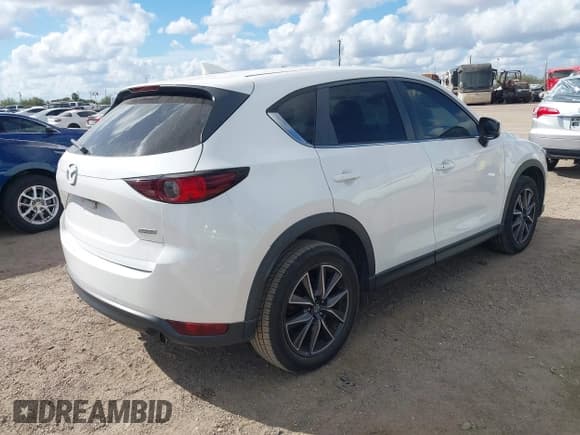 ✅ 2018 Mazda CX-5 Touring • VIN: JM3KFACM6J1409067 • Лот: 43716812. Опубликован ранее на IAAI с пробегом 76 489 миль. Бесплатный доступ к архиву аукционных продаж из США и подробный отчёт об истории автомобиля на DreamBid. Изображение 4.
