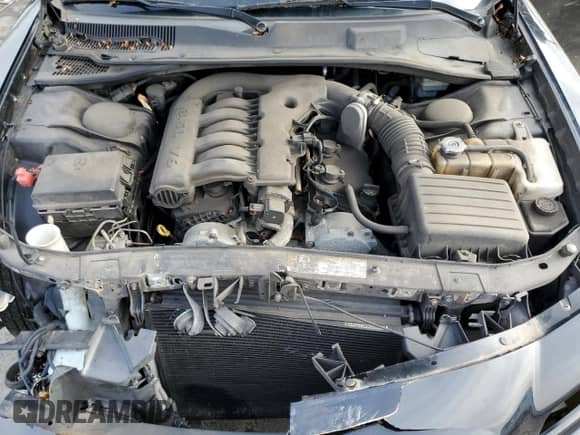 2010 Dodge Charger SXT с VIN 2B3CA3CV7AH156084, выставлен на аукционе Copart как лот 81144174 с пробегом 144 636 миль миль и Списание • Salvage title. История ставок и продаж доступна на DreamBid. Изображение 11.