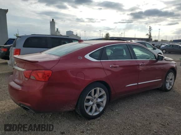 2014 Chevrolet Impala LTZ with VIN 1G1155S36EU145708, listed as a Copart auction lot 82423055 with 140,731 mi miles and Salvage title. Bid and sale history available at DreamBid. Image 3.
