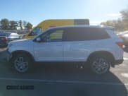 ✅ 2023 Honda Passport EX-L • VIN: 5FNYF8H53PB014146 • Lot: 43469474. Listed on IAAI with 32,713 mi. Free auction sales archive from the USA and detailed vehicle history report at DreamBid. Image 14.