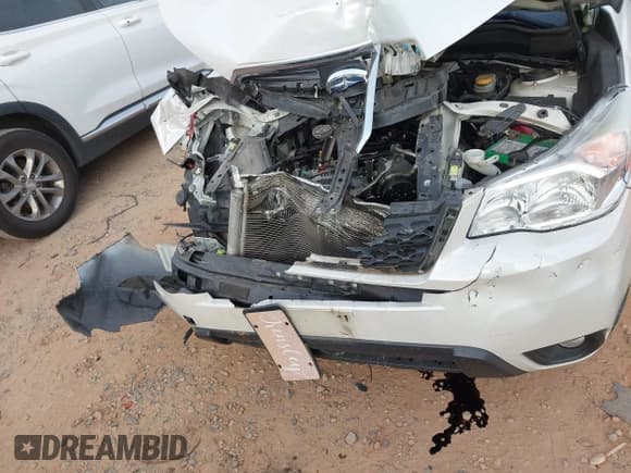 ✅ 2014 Subaru Forester Limited • VIN: JF2SJAHC9EH558076 • Lot: 43749595. Listed on IAAI with 107,738 mi. Free auction sales archive from the USA and detailed vehicle history report at DreamBid. Image 17.