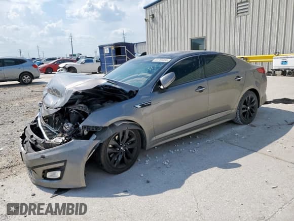 ✅ 2015 Kia Optima SX Turbo • VIN: 5XXGR4A69FG496731 • Lot: 69705365. Listed on Copart with 139,271 mi. Free auction sales archive from the USA and detailed vehicle history report at DreamBid. Image 1.