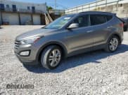✅ 2015 Hyundai Santa Fe • VIN: 5XYZW4LAXFG239754 • Lot: 71499665. Listed on Copart with 75,339 mi. Free auction sales archive from the USA and detailed vehicle history report at DreamBid. Image 1.