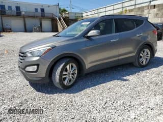 ✅ 2015 Hyundai Santa Fe • VIN: 5XYZW4LAXFG239754 • Lot: 71499665. Wystawiony na Copart z przebiegiem 75 339 mil. Bezpłatny archiwum sprzedaży aukcyjnych z USA i szczegółowy raport historii pojazdu na DreamBid. Zdjęcie 1.