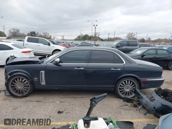 ✅ 2007 Jaguar XJ • VIN: SAJXA73C97TH14362 • Lot: 41305716. Listed on IAAI with 120,924 mi. Free auction sales archive from the USA and detailed vehicle history report at DreamBid. Image 14.