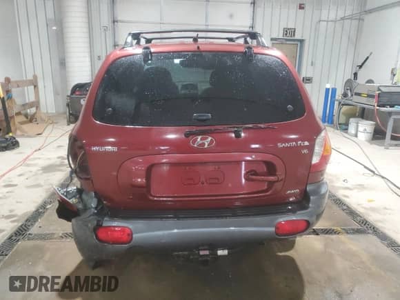 2004 Hyundai Santa Fe GLS с VIN KM8SC73D74U854582, выставлен на аукционе Copart как лот 46097685 с пробегом Не указан миль и Списание • Salvage title. История ставок и продаж доступна на DreamBid. Изображение 6.