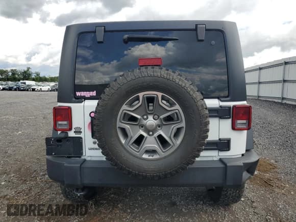 ✅ 2018 Jeep Wrangler Unlimited Rubicon Recon • VIN: 1C4BJWFG2JL873942 • Lot: 58026995. Wystawiony na Copart z przebiegiem 98 542 mil. Bezpłatny archiwum sprzedaży aukcyjnych z USA i szczegółowy raport historii pojazdu na DreamBid. Zdjęcie 6.
