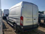 ✅ 2016 Ford Transit Cargo • VIN: 1FTYE1CM6GKA43720 • Lot: 63064055. Listed on Copart with 124,726 mi. Free auction sales archive from the USA and detailed vehicle history report at DreamBid. Image 2.