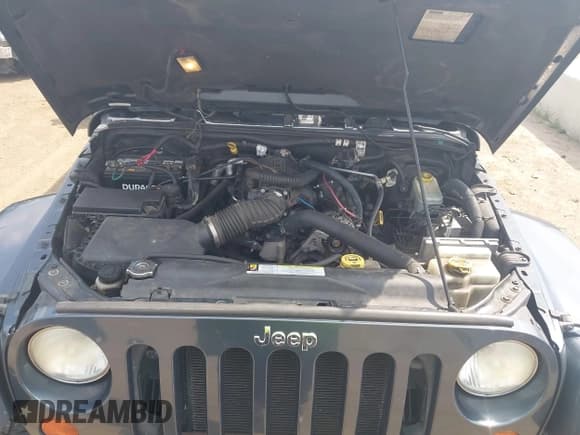 ✅ 2007 Jeep Wrangler Unlimited Sahara • VIN: 1J4GA591X7L117415 • Lot: 42509979. Listed on IAAI with 96,192 mi. Free auction sales archive from the USA and detailed vehicle history report at DreamBid. Image 10.