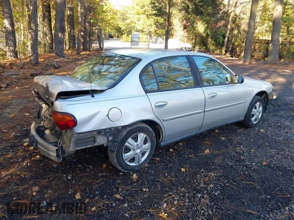 ✅ 2002 Chevrolet Malibu • VIN: 1G1ND52J72M718209 • Lot: 43550014. Listed on IAAI with 99,204 mi. Free auction sales archive from the USA and detailed vehicle history report at DreamBid. Image 4.