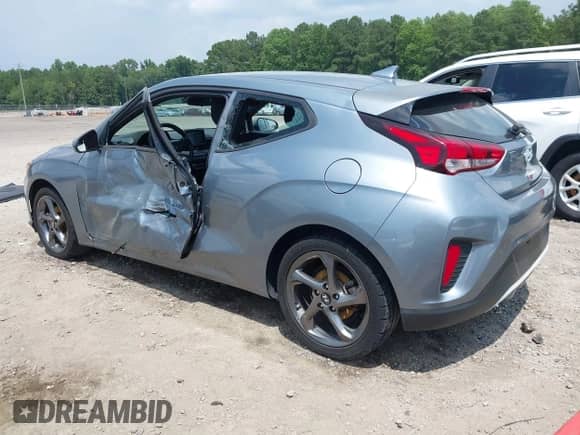 2019 Hyundai Veloster Premium with VIN KMHTG6AF5KU017950, listed as a IAAI auction lot 42611554 with 105,396 mi miles and . Bid and sale history available at DreamBid. Image 3.