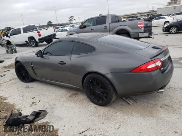 ✅ 2011 Jaguar XK XKR • VIN: SAJWA4DC7BMB40355 • Lot: 88007985. Listed on Copart with Not provided. Free auction sales archive from the USA and detailed vehicle history report at DreamBid. Image 2.
