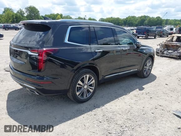 ✅ 2022 Cadillac XT6 Premium Luxury • VIN: 1GYKPCRSXNZ103675 • Lot: 42934957. Listed on IAAI with 36,729 mi. Free auction sales archive from the USA and detailed vehicle history report at DreamBid. Image 4.