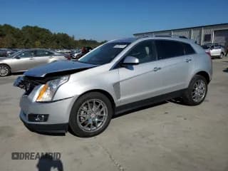 ✅ 2013 Cadillac SRX Performance Collection • VIN: 3GYFNHE39DS555633 • Lot: 83997915. Listed on Copart with 113,168 mi. Free auction sales archive from the USA and detailed vehicle history report at DreamBid. Image 1.
