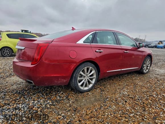 ✅ 2013 Cadillac XTS Luxury • VIN: 2G61P5S35D9141293 • Лот: 93905275. Опубликован ранее на Copart с пробегом 137 641 миль. Бесплатный доступ к архиву аукционных продаж из США и подробный отчёт об истории автомобиля на DreamBid. Изображение 3.