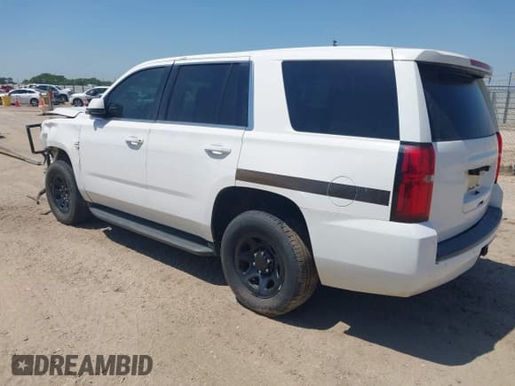 ✅ 2015 Chevrolet Tahoe Commercial • VIN: 1GNLC2ECXFR673084 • Lot: 41881353. Listed on IAAI with 256,096 mi. Free auction sales archive from the USA and detailed vehicle history report at DreamBid. Image 3.