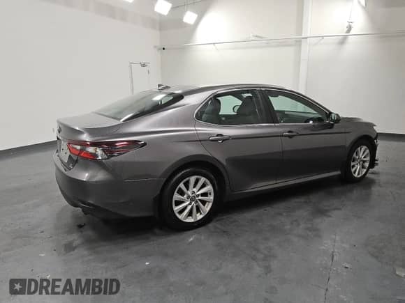 2023 Toyota Camry LE с VIN 4T1C11BKXPU085068, выставлен на аукционе Copart как лот 84569265 с пробегом 48 120 миль миль и Чистый • Clean title. История ставок и продаж доступна на DreamBid. Изображение 3.