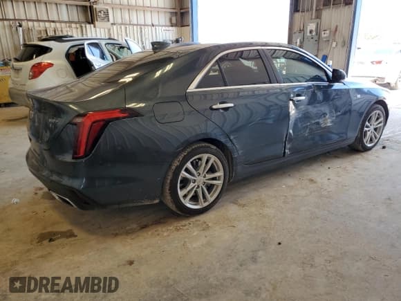 ✅ 2022 Cadillac CT4 Luxury • VIN: 1G6DJ5RK3N0113628 • Лот: 55824815. Опубликован ранее на Copart с пробегом 33 425 миль. Бесплатный доступ к архиву аукционных продаж из США и подробный отчёт об истории автомобиля на DreamBid. Изображение 3.
