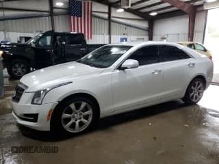 ✅ 2015 Cadillac ATS Luxury AWD • VIN: 1G6AH5RX5F0125100 • Lot: 89654975. Wystawiony na Copart z przebiegiem 76 063 mil. Bezpłatny archiwum sprzedaży aukcyjnych z USA i szczegółowy raport historii pojazdu na DreamBid. Zdjęcie 1.