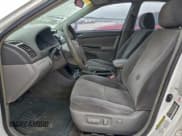 ✅ 2006 Toyota Camry LE • VIN: 4T1BE32KX6U709977 • Лот: 93854785. Опубликован ранее на Copart с пробегом Не указан. Бесплатный доступ к архиву аукционных продаж из США и подробный отчёт об истории автомобиля на DreamBid. Изображение 7.