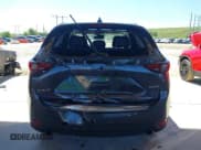 ✅ 2021 Mazda CX-5 Grand Touring • VIN: JM3KFADM9M1381655 • Lot: 43436750. Wystawiony na IAAI z przebiegiem 64 217 mil. Bezpłatny archiwum sprzedaży aukcyjnych z USA i szczegółowy raport historii pojazdu na DreamBid. Zdjęcie 16.