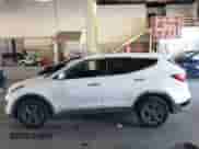 2015 Hyundai Santa Fe z VIN 5XYZTDLB4FG294735, wystawiony jako IAAI lot #43230960 z przebiegiem 169 342 mil mil oraz . Historia ofert i sprzedaży dostępna na DreamBid. Obrazek 15.