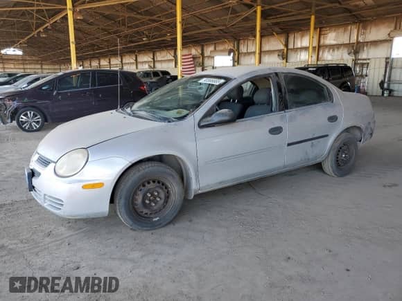 2005 Dodge Neon SE z VIN 1B3ES26C65D158616, wystawiony jako Copart lot #90566665 z przebiegiem 296 496 mil mil oraz Czysty tytuł • Clean title. Historia ofert i sprzedaży dostępna na DreamBid. Obrazek 1.