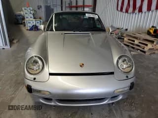 ✅ 1997 Porsche 911 • VIN: WP0AA2992VS321404 • Лот: 45675025. Опубликован ранее на Copart с пробегом Не указан. Бесплатный доступ к архиву аукционных продаж из США и подробный отчёт об истории автомобиля на DreamBid. Изображение 5.