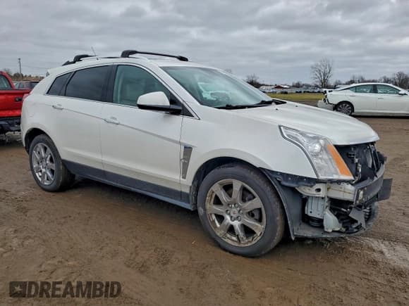 ✅ 2011 Cadillac SRX Premium Collection • VIN: 3GYFNFEY7BS634988 • Лот: 94653205. Опубликован ранее на Copart с пробегом 163 101 миль. Бесплатный доступ к архиву аукционных продаж из США и подробный отчёт об истории автомобиля на DreamBid. Изображение 4.