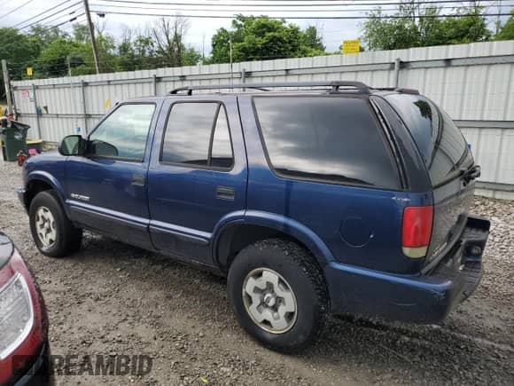 2004 Chevrolet Blazer LS z VIN 1GNDT13X04K103539, wystawiony jako Copart lot #55690024 z przebiegiem Nie podano mil oraz Szkoda całkowita • Salvage title. Historia ofert i sprzedaży dostępna na DreamBid. Obrazek 2.