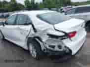 2022 Toyota Camry LE with VIN 4T1R11BK3NU064246, listed as a IAAI auction lot 43037907 with 64,971 mi miles and . Bid and sale history available at DreamBid. Image 6.