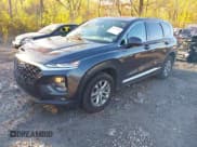 ✅ 2020 Hyundai Santa Fe SEL • VIN: 5NMS3CADXLH221791 • Lot: 43477561. Listed on IAAI with 92,143 mi. Free auction sales archive from the USA and detailed vehicle history report at DreamBid. Image 17.